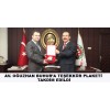 HEMŞEHRİMİZ AV. OĞUZHAN BUHUR’A TEŞEKKÜR PLAKETİ TAKDİM EDİLDİ