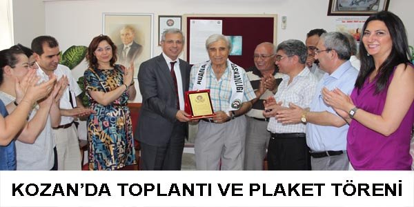 KOZAN’DA TOPLANTI VE PLAKET TÖRENİ